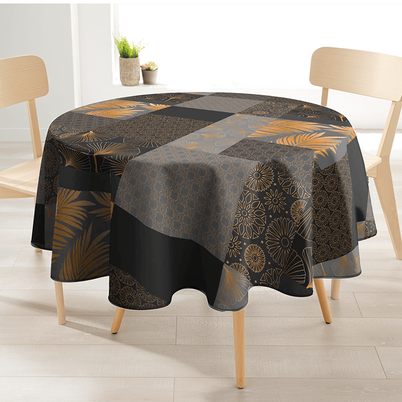 Black-grey round polyester stain-resistant tablecloth with ginkgo leaves.