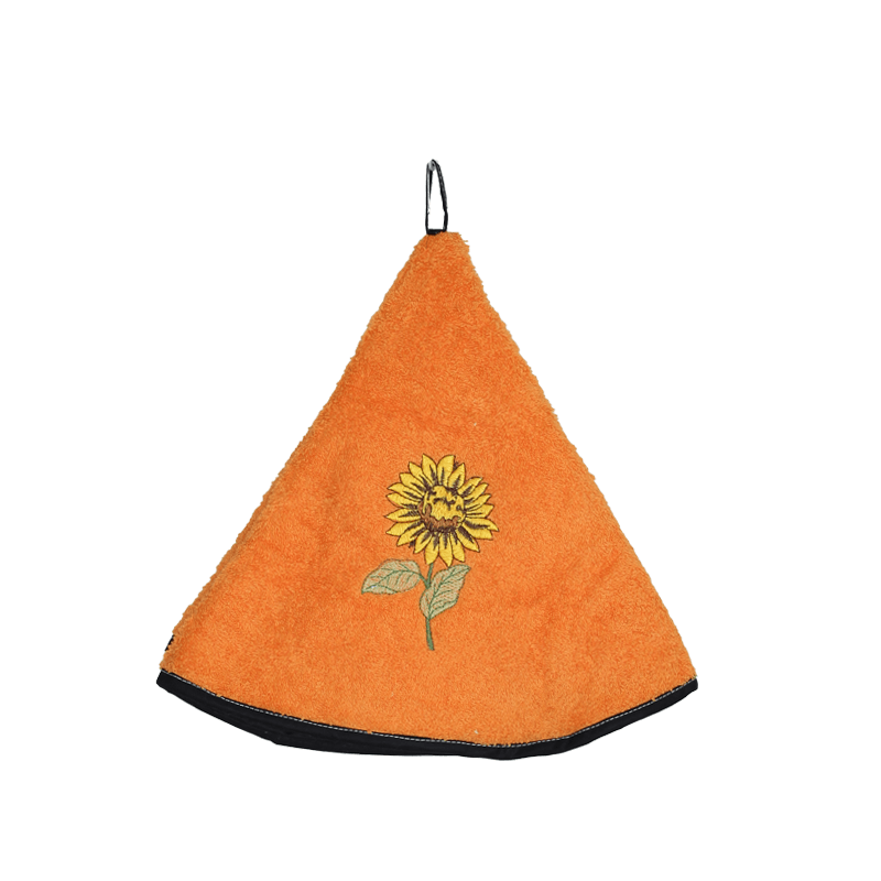 Round cotton kitchen towel with sunflower design in orange, by Franse Tafelkleden.