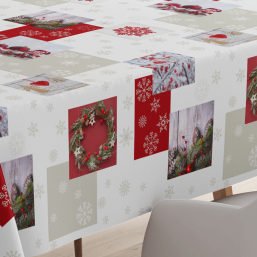 Red and white tablecloth with Christmas balls, wreaths, and snowflakes for indoor or outdoor use.