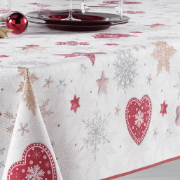 Ecru luxury tablecloth with Christmas trees and snowflakes in a red print.